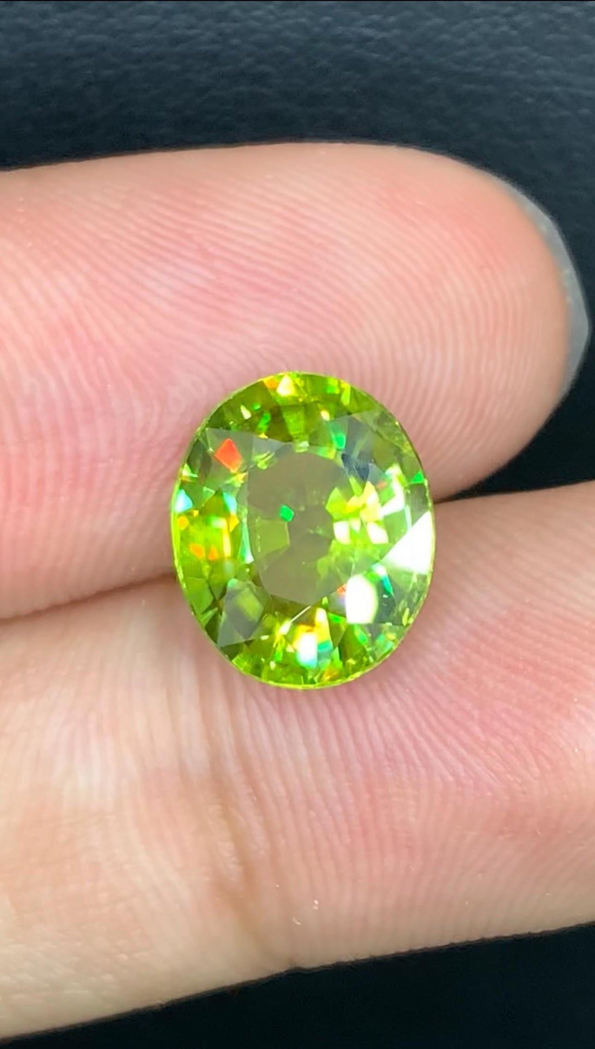 4.30 CT Oval Sphene Gemstone: Yellow-Green Titanite, Strong Trichroism