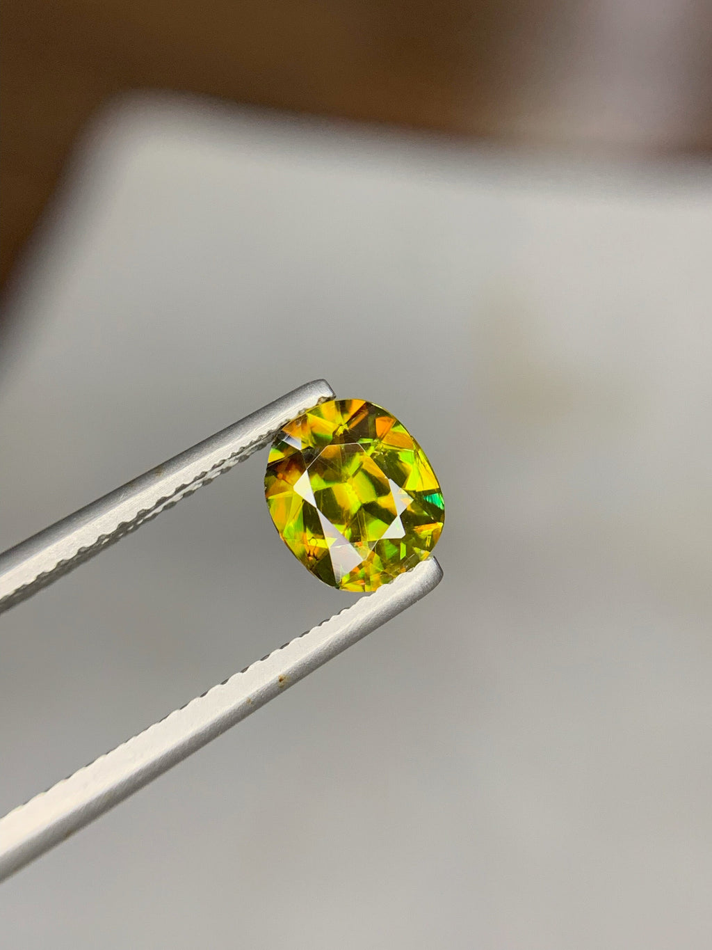 1.50 CT Natural Sphene Gemstone: Oval Cut, Himalayan Origin