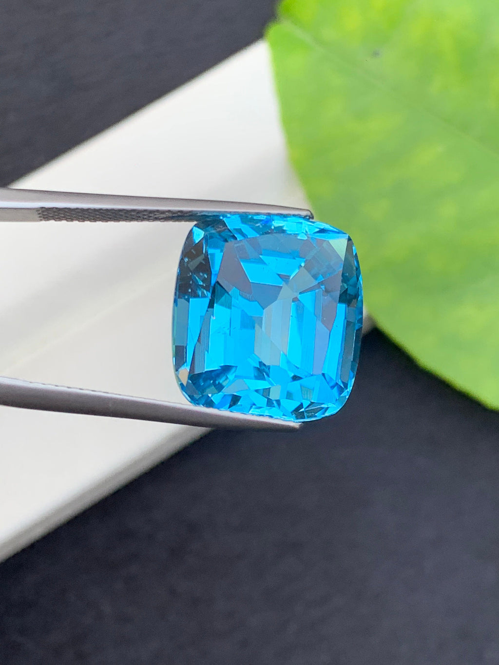 21.5 CT Swiss Blue Topaz Gemstone: Step Cushion Cut, Loupe Clean