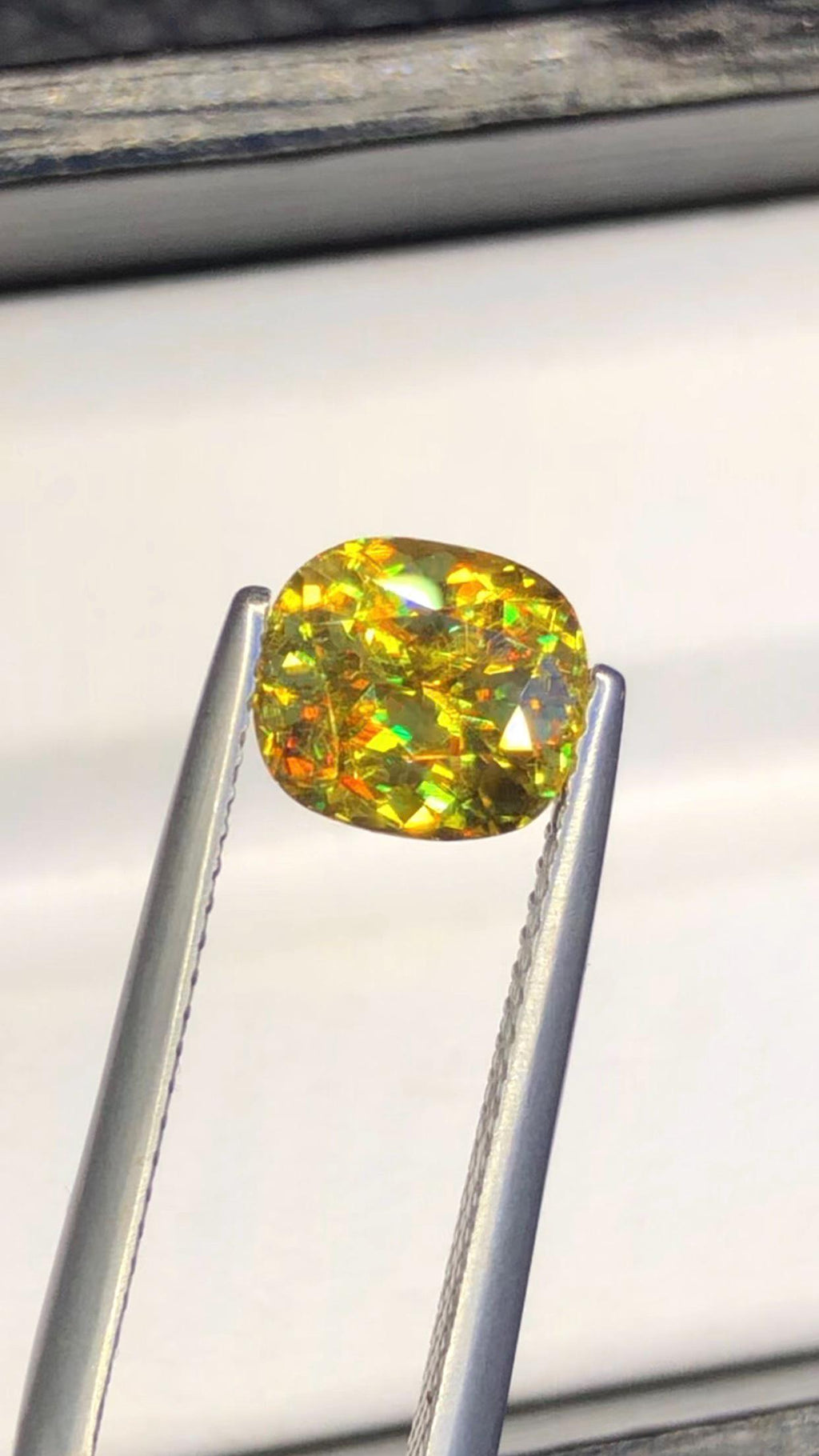 2.05 CT Cushion Cut Sphene Gemstone: Yellow-Red Trichroism