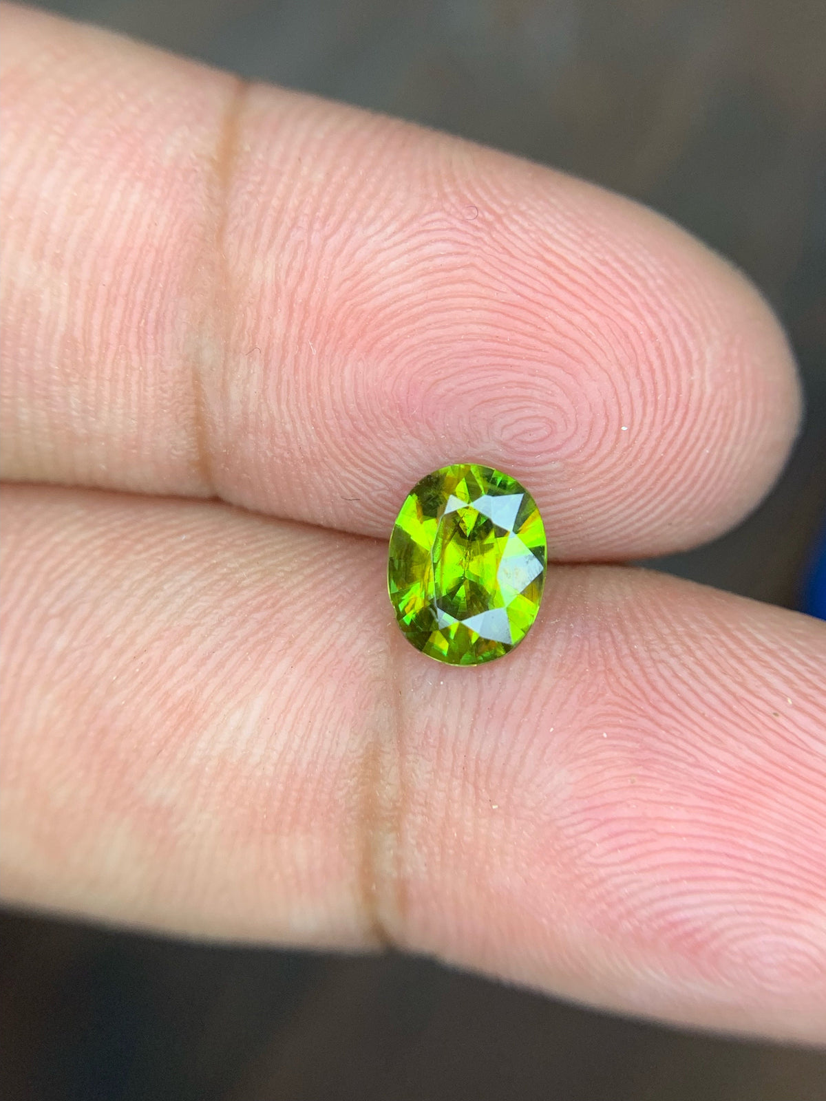 AAA Green Sphene Gemstone: Oval Cut, 0.95 CT, Himalayan Origin