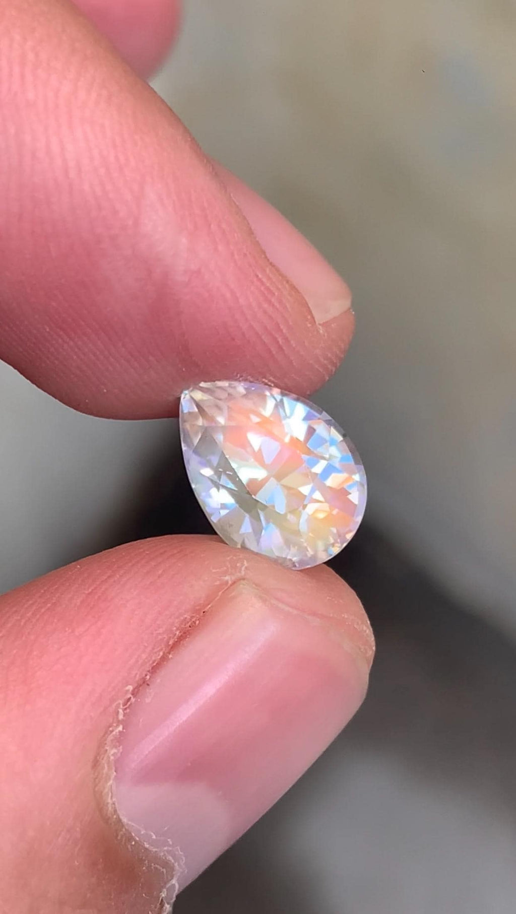 Rainbow Moonstone Gemstone: Pear Shape, VVS Clarity, Madagascar Origin