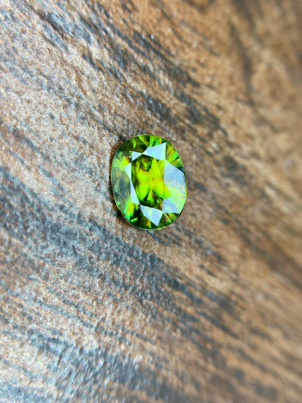 AAA Green Sphene Gemstone: Oval Cut, 0.95 CT, Himalayan Origin