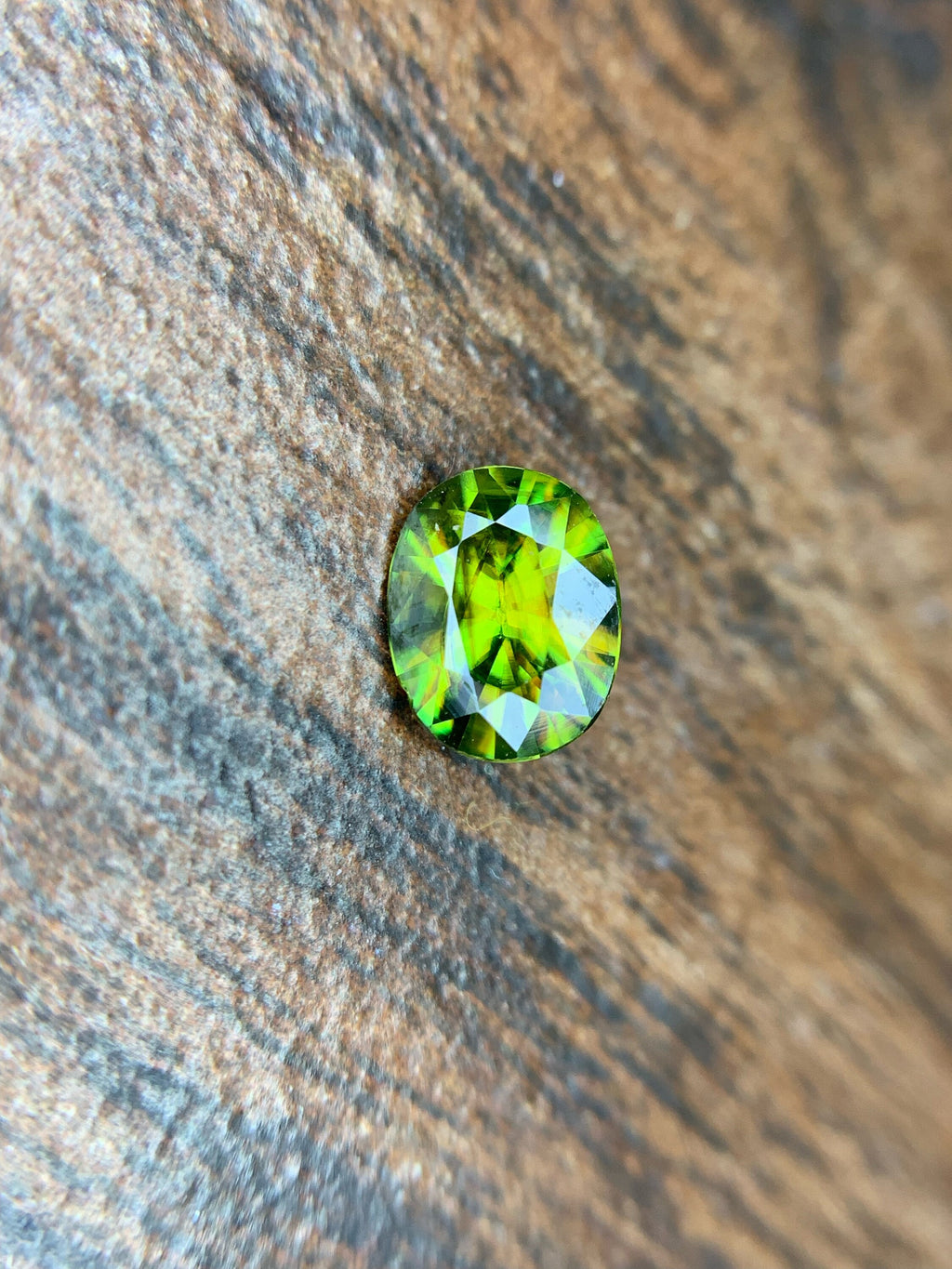 AAA Green Sphene Gemstone: Oval Cut, 0.95 CT, Himalayan Origin