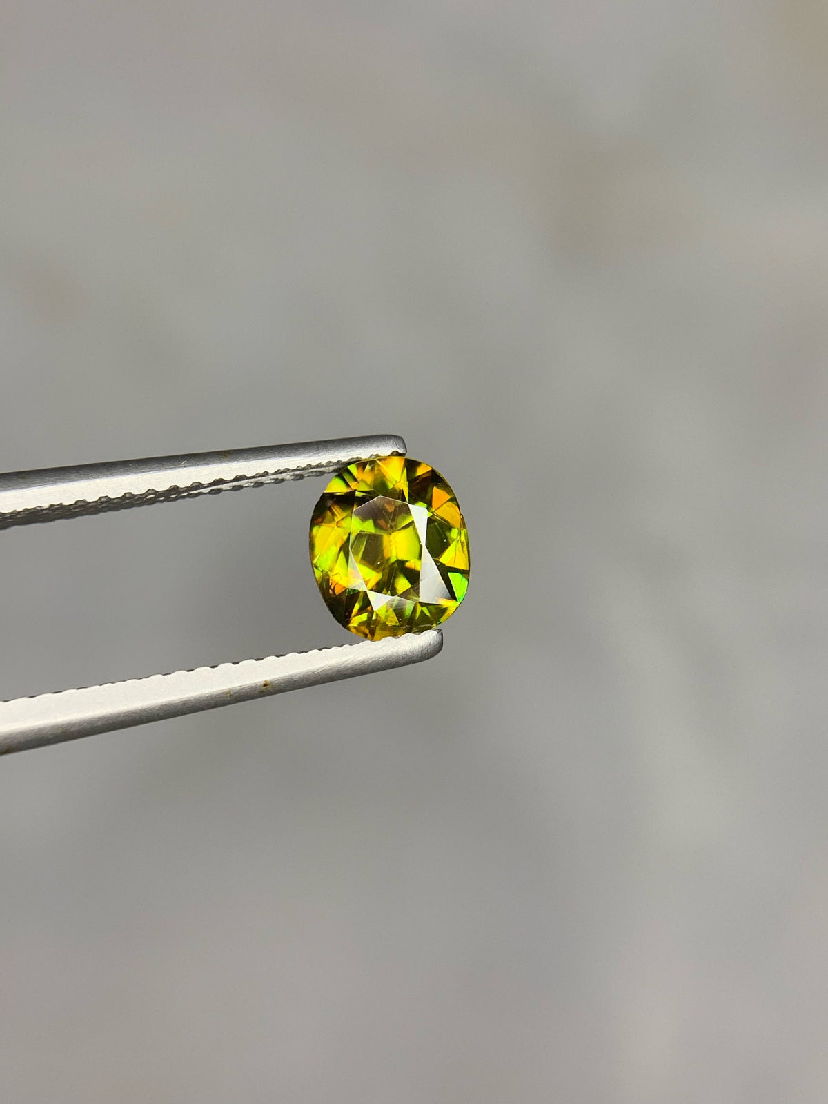 1.50 CT Natural Sphene Gemstone: Oval Cut, Himalayan Origin