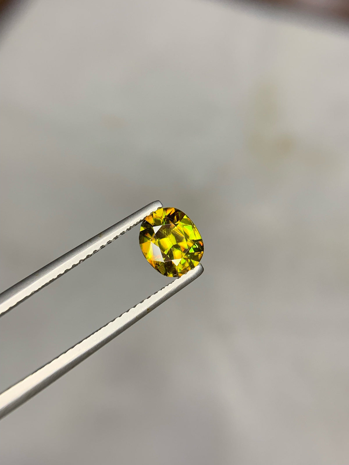 1.50 CT Natural Sphene Gemstone: Oval Cut, Himalayan Origin