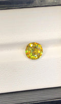 Natural Sphene Gemstone: Faceted Round Titanite, 1.40 CT
