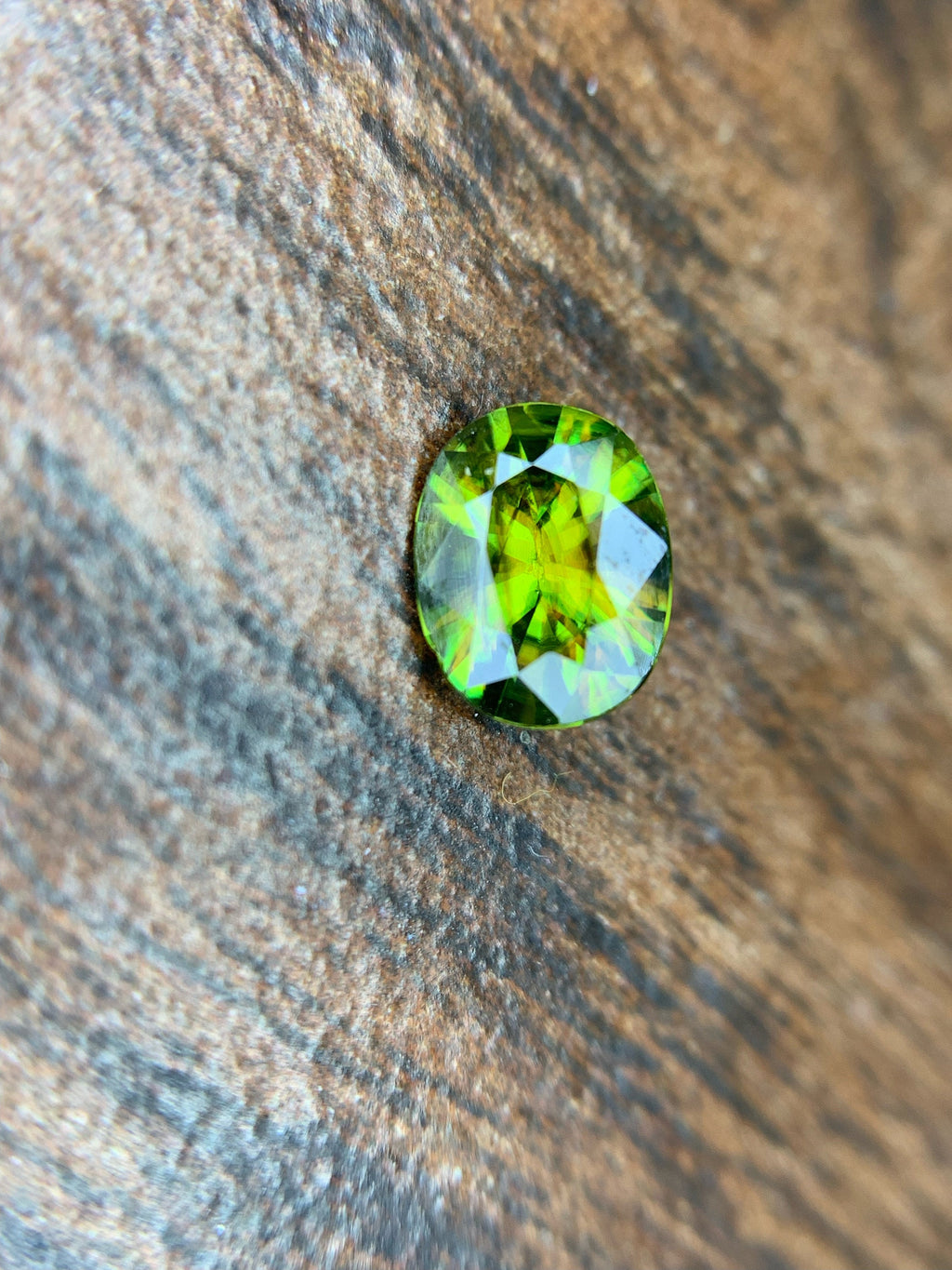 AAA Green Sphene Gemstone: Oval Cut, 0.95 CT, Himalayan Origin