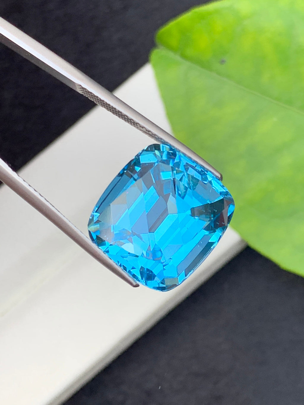 21.5 CT Swiss Blue Topaz Gemstone: Step Cushion Cut, Loupe Clean