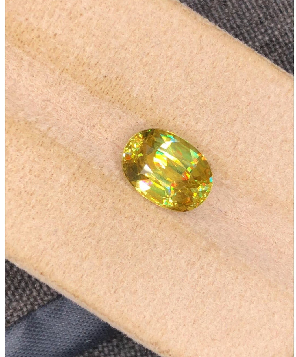 Natural Fire Sphene Gemstone: Oval Cut, 2.83 CT