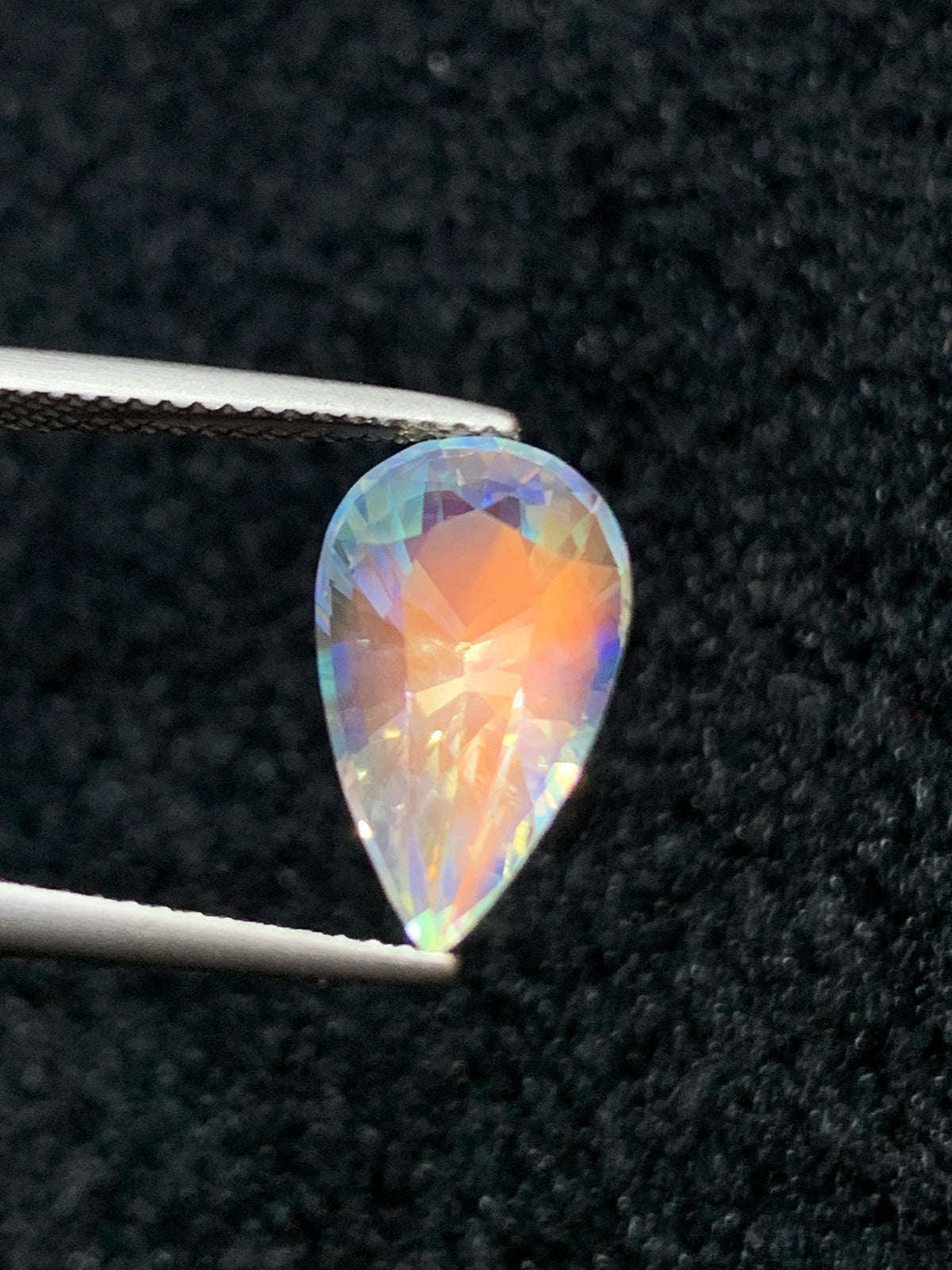 Rainbow Moonstone Gemstone: Pear Shape, VVS Clarity, Madagascar Origin