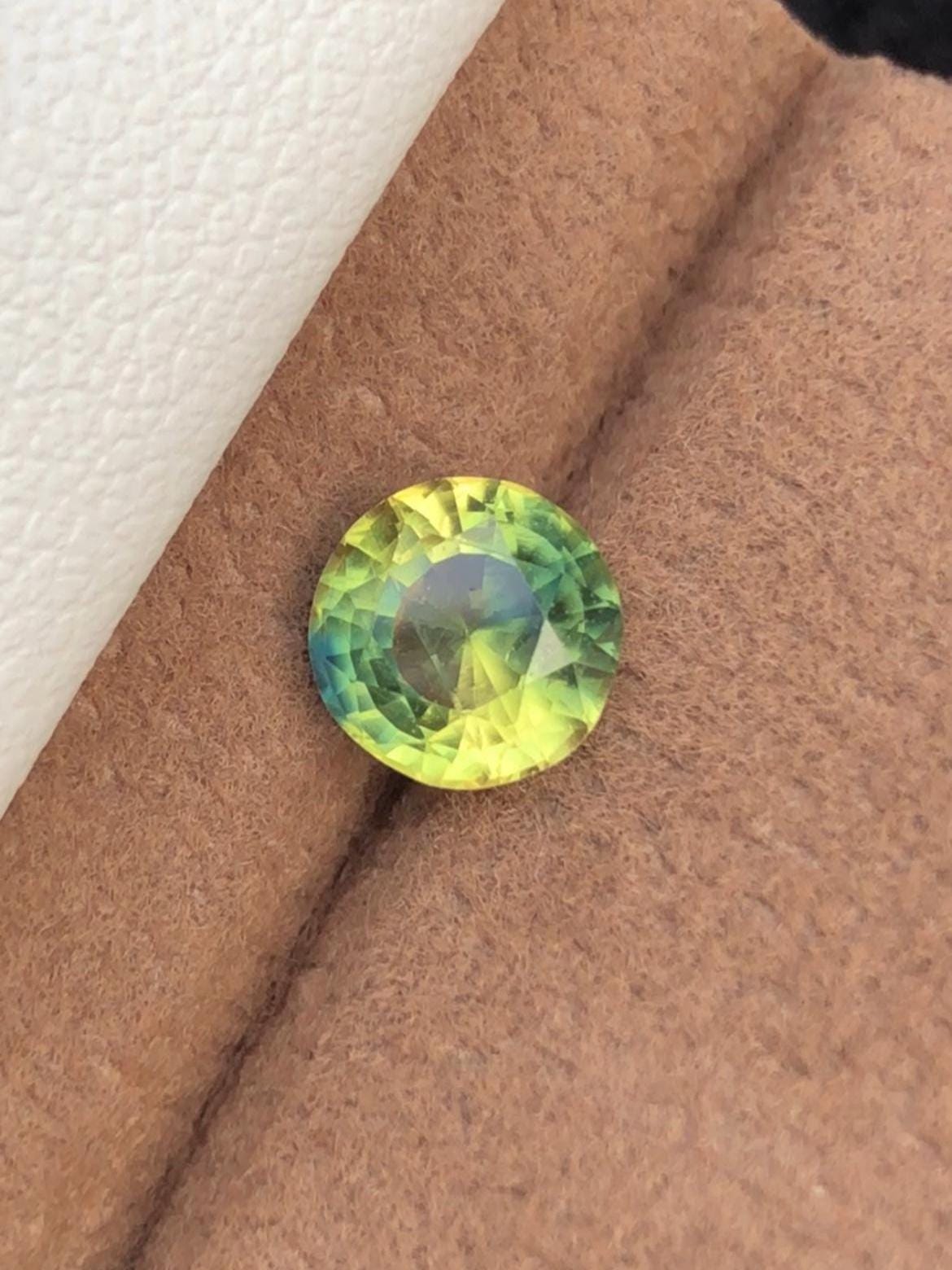 Bi-Color Sapphire 1.53ct Round Cut • Yellow & Blue Party Sapphire from Madagascar With Certificate