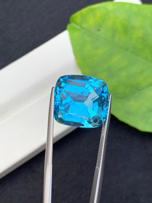 21.5 CT Swiss Blue Topaz Gemstone: Step Cushion Cut, Loupe Clean