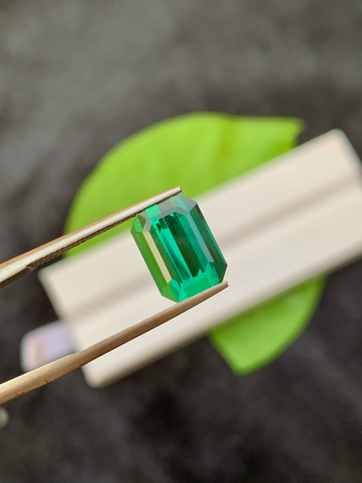 3.95 CT Forest Green Tourmaline Gemstone: Emerald Cut, Afghanistan Origin