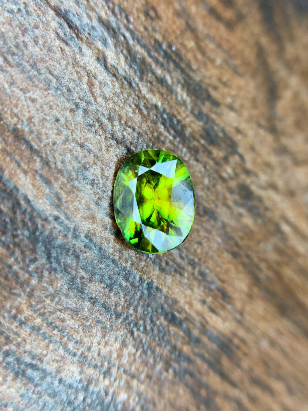 AAA Green Sphene Gemstone: Oval Cut, 0.95 CT, Himalayan Origin