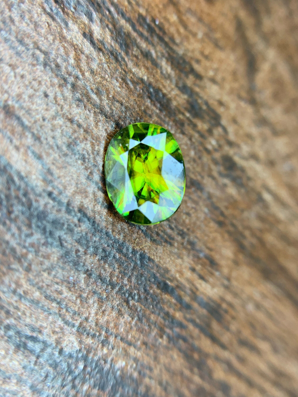 AAA Green Sphene Gemstone: Oval Cut, 0.95 CT, Himalayan Origin