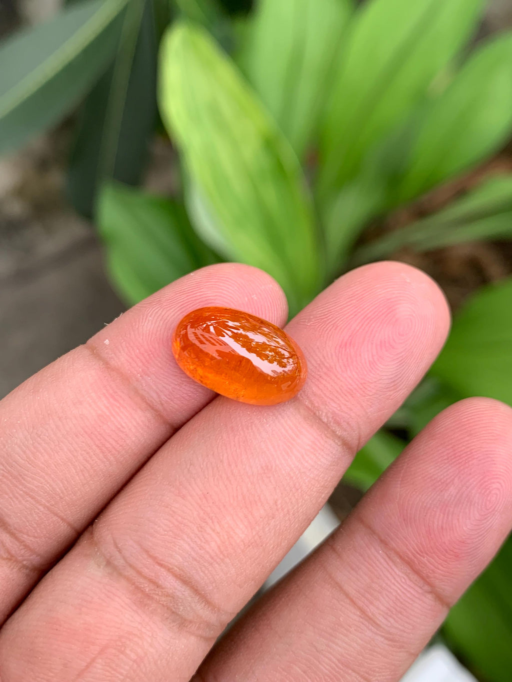 14.50 Carat Fanta Spessartite Garnet: Vivid Mandarin Orange Oval Gemstone