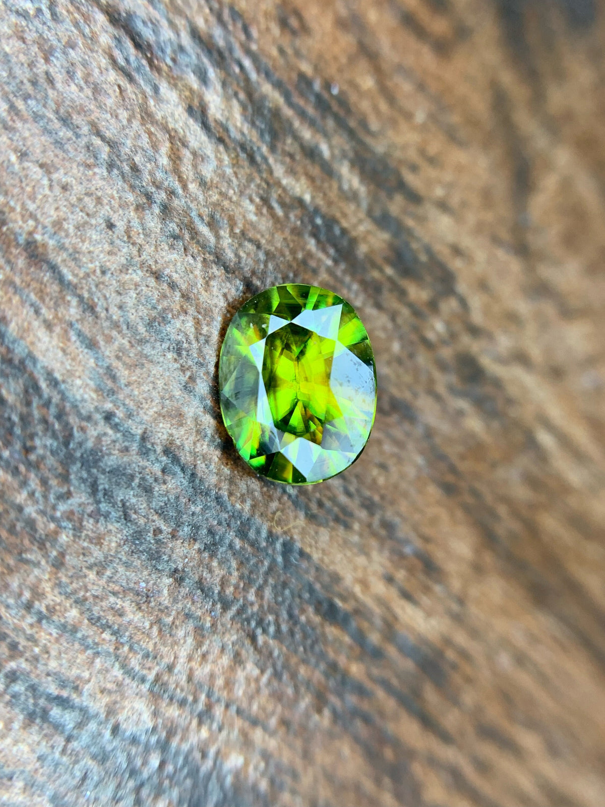 AAA Green Sphene Gemstone: Oval Cut, 0.95 CT, Himalayan Origin