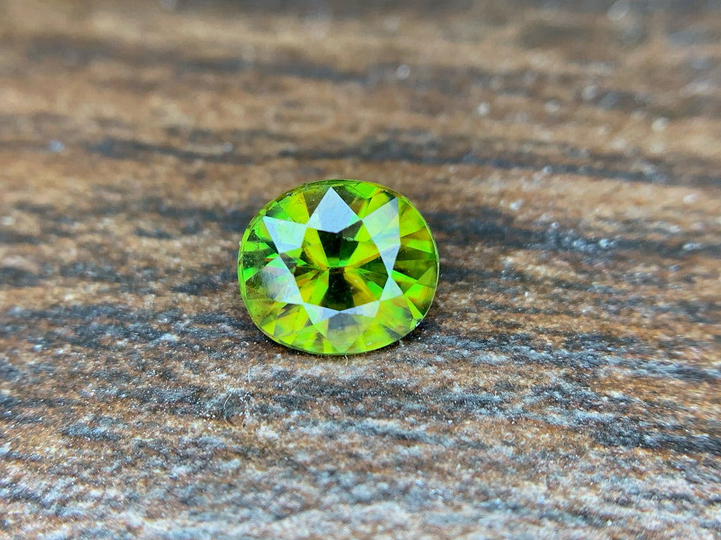 Natural Fire Sphene Gemstone: Round Cut, 0.95 ct, Himalayan Origin
