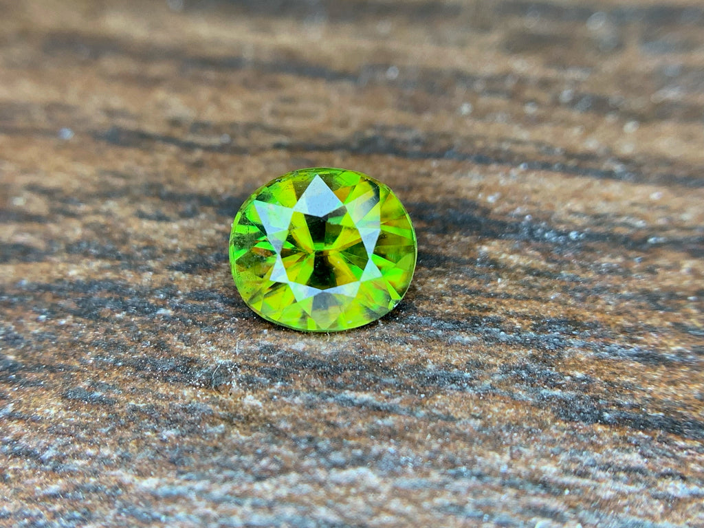 Natural Fire Sphene Gemstone: Round Cut, 0.95 ct, Himalayan Origin