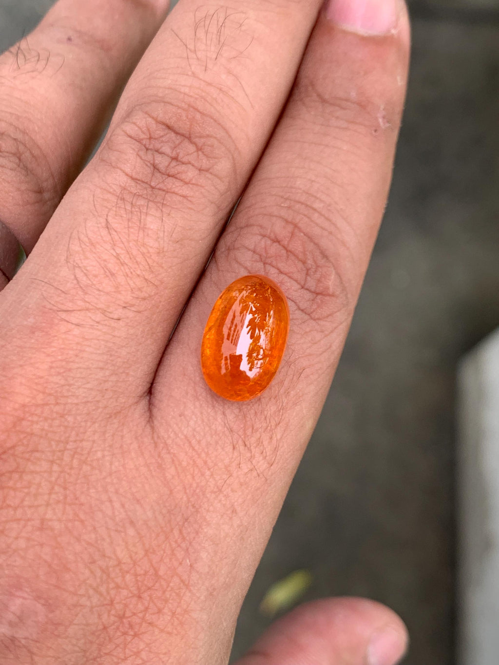 14.50 Carat Fanta Spessartite Garnet: Vivid Mandarin Orange Oval Gemstone