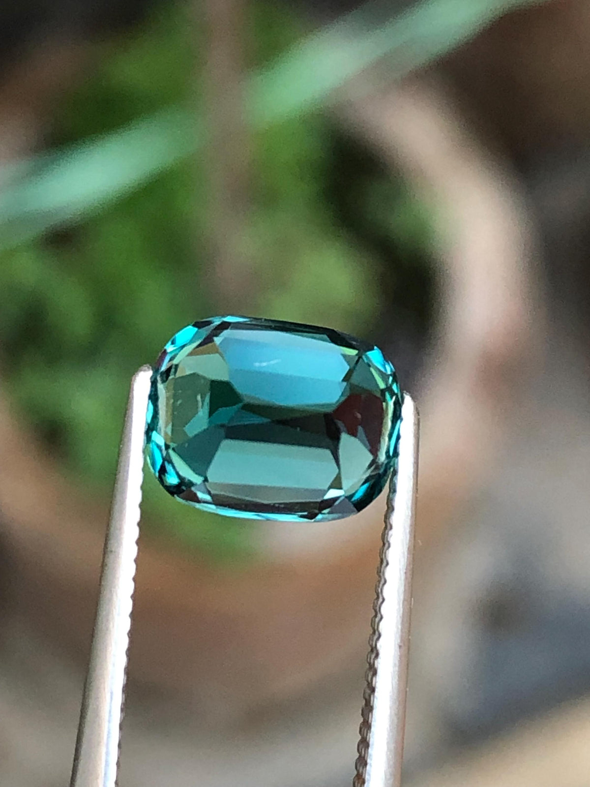 Natural Neon Blue Tourmaline Cushion Cut – 2.70 Carat from Afghanistan Facated gemstone