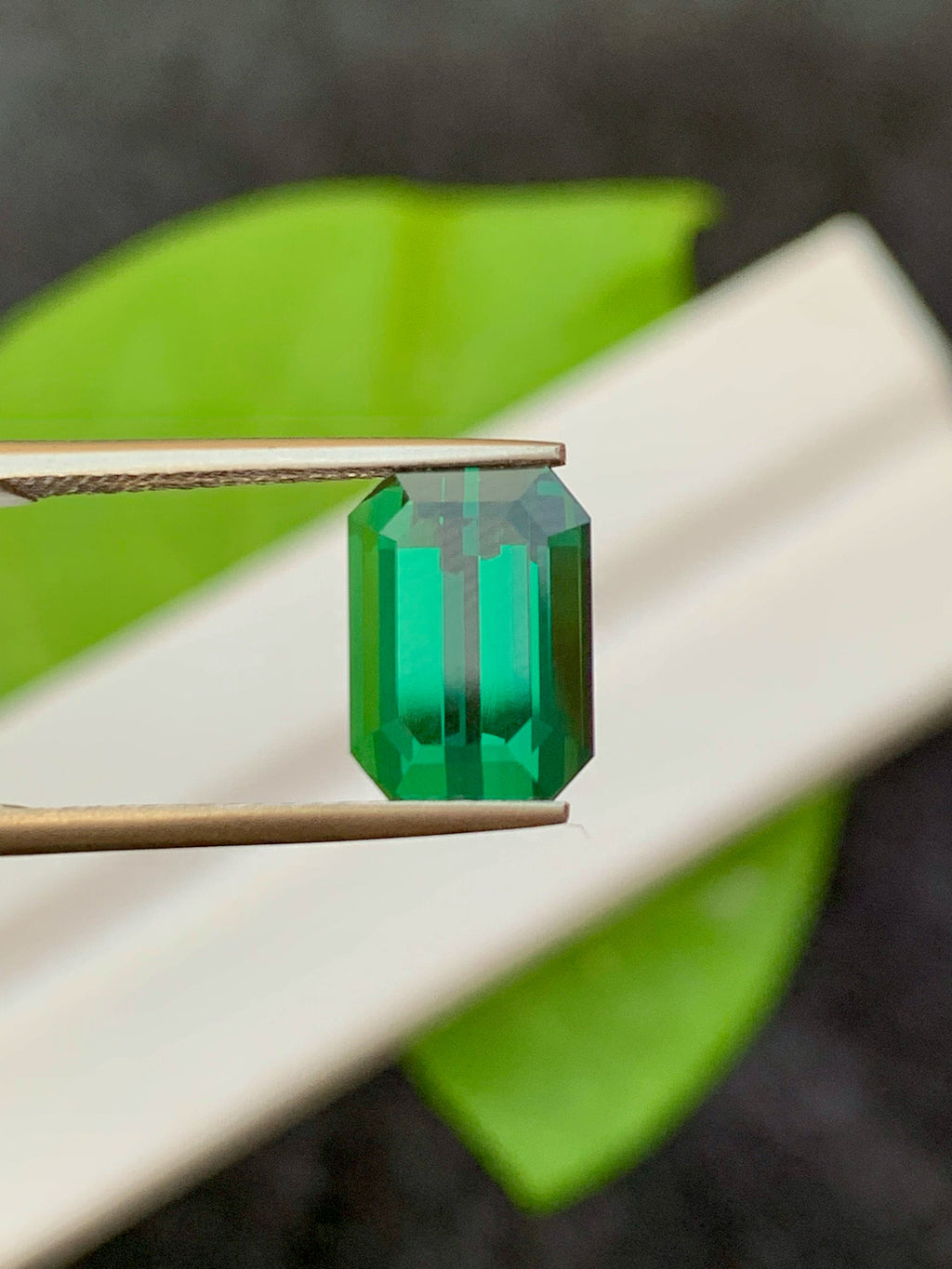 3.95 CT Forest Green Tourmaline Gemstone: Emerald Cut, Afghanistan Origin