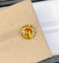 Natural Fire Sphene Gemstone: Round Cut, 1.45 CT, Himalayan Origin