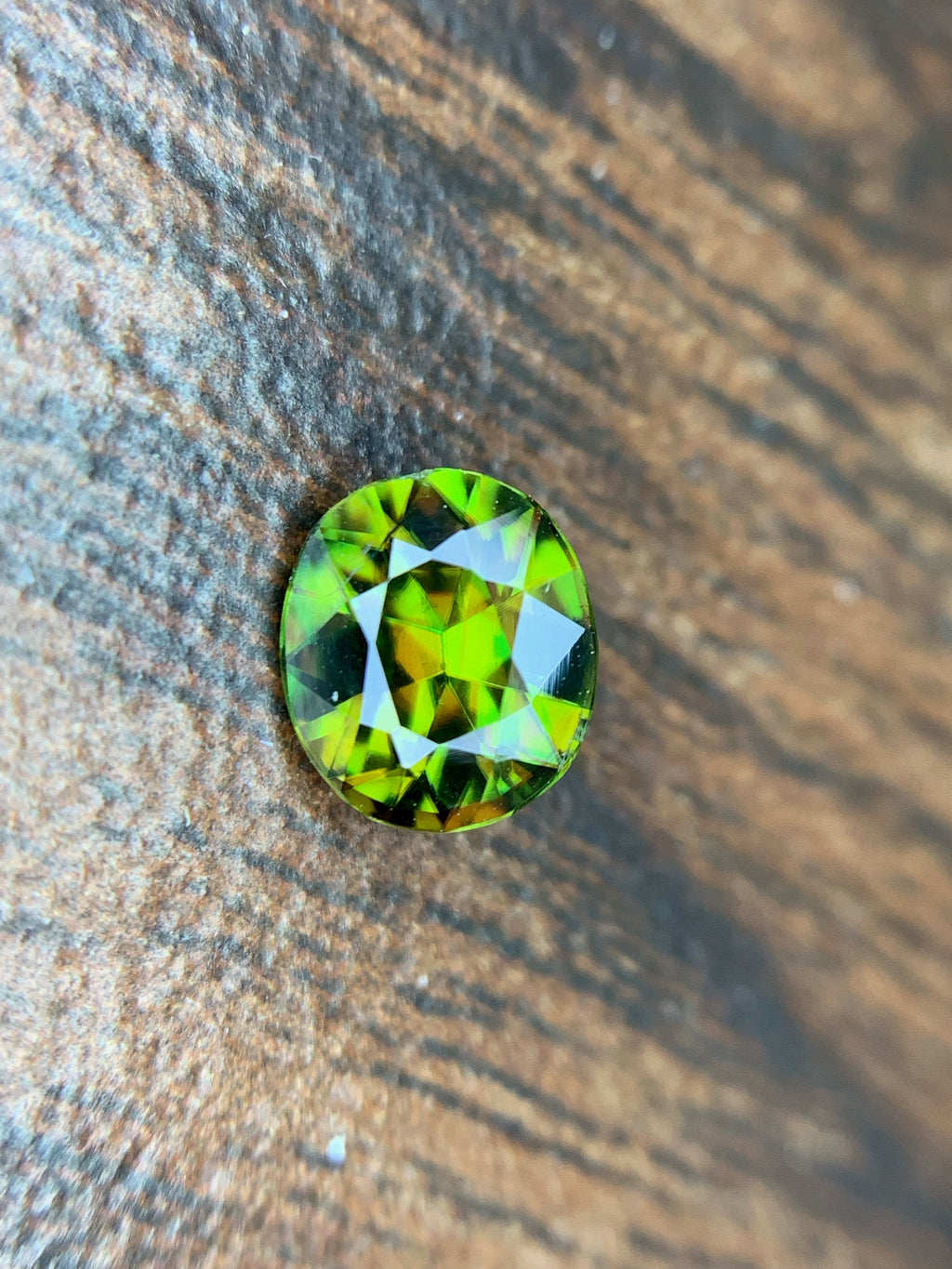 1.15 CT Natural Sphene Gemstone: Oval Cut, Himalayan Origin