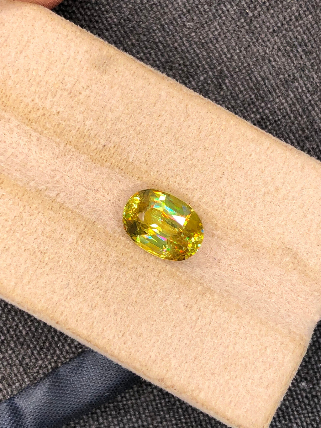 Natural Fire Sphene Gemstone: Oval Cut, 2.83 CT