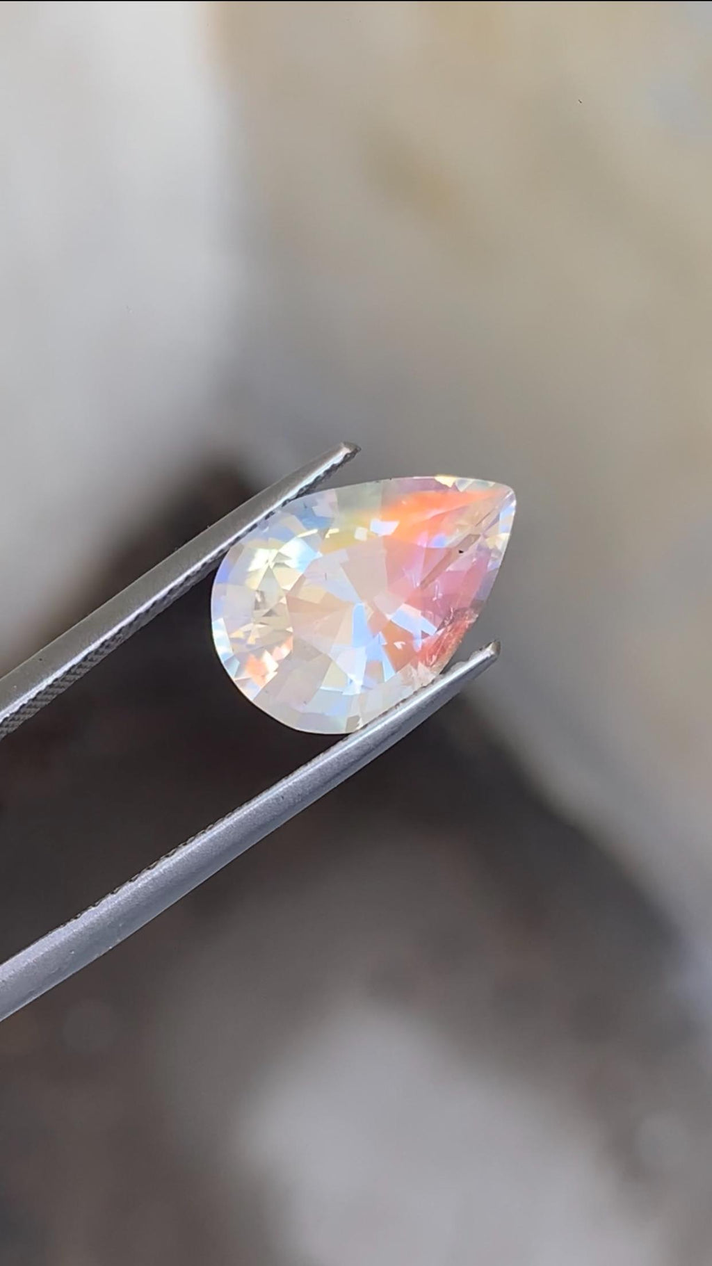 Rainbow Moonstone Gemstone: Pear Shape, VVS Clarity, Madagascar Origin