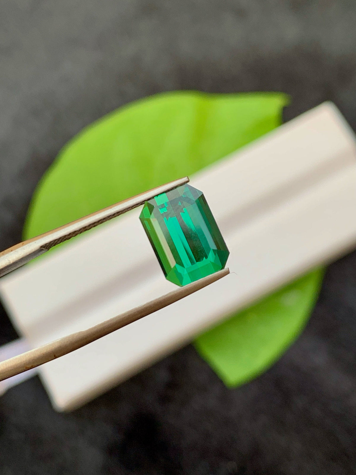 3.95 CT Forest Green Tourmaline Gemstone: Emerald Cut, Afghanistan Origin