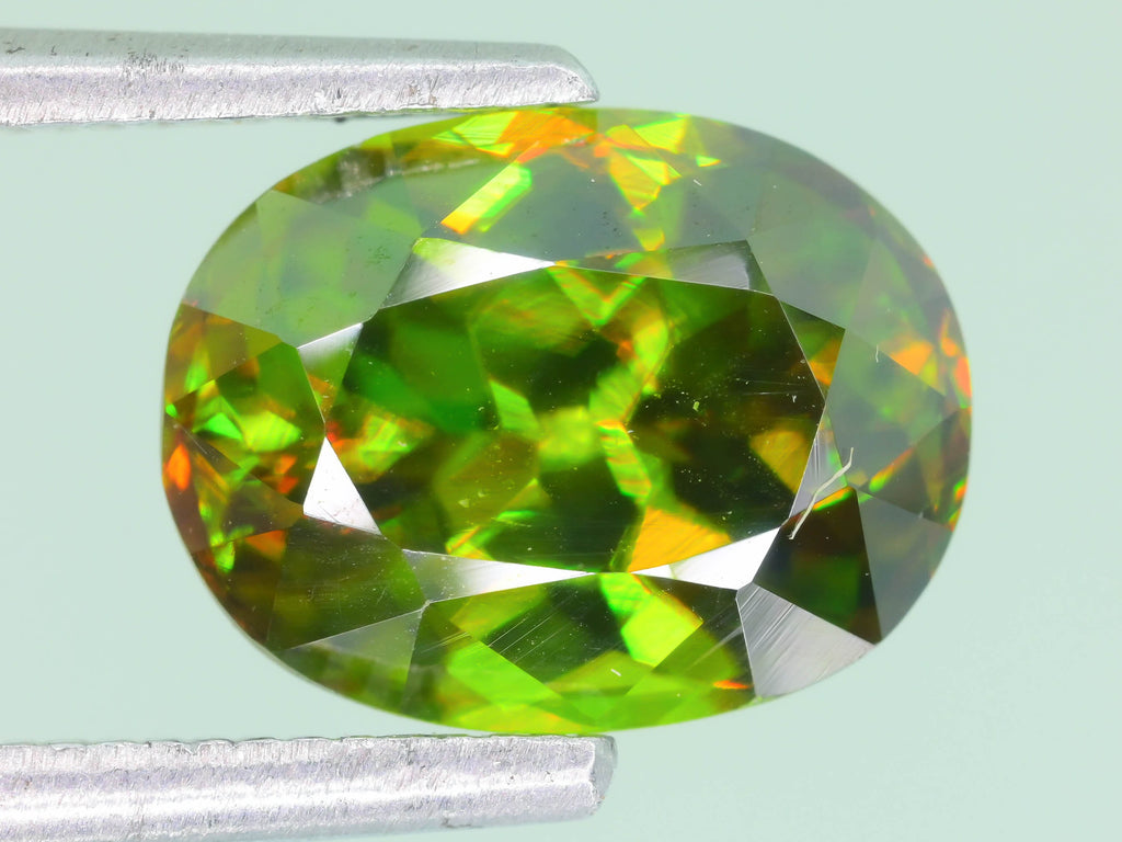 Chrome Sphene Gemstone: 1.55 Carat Faceted Oval, African Origin
