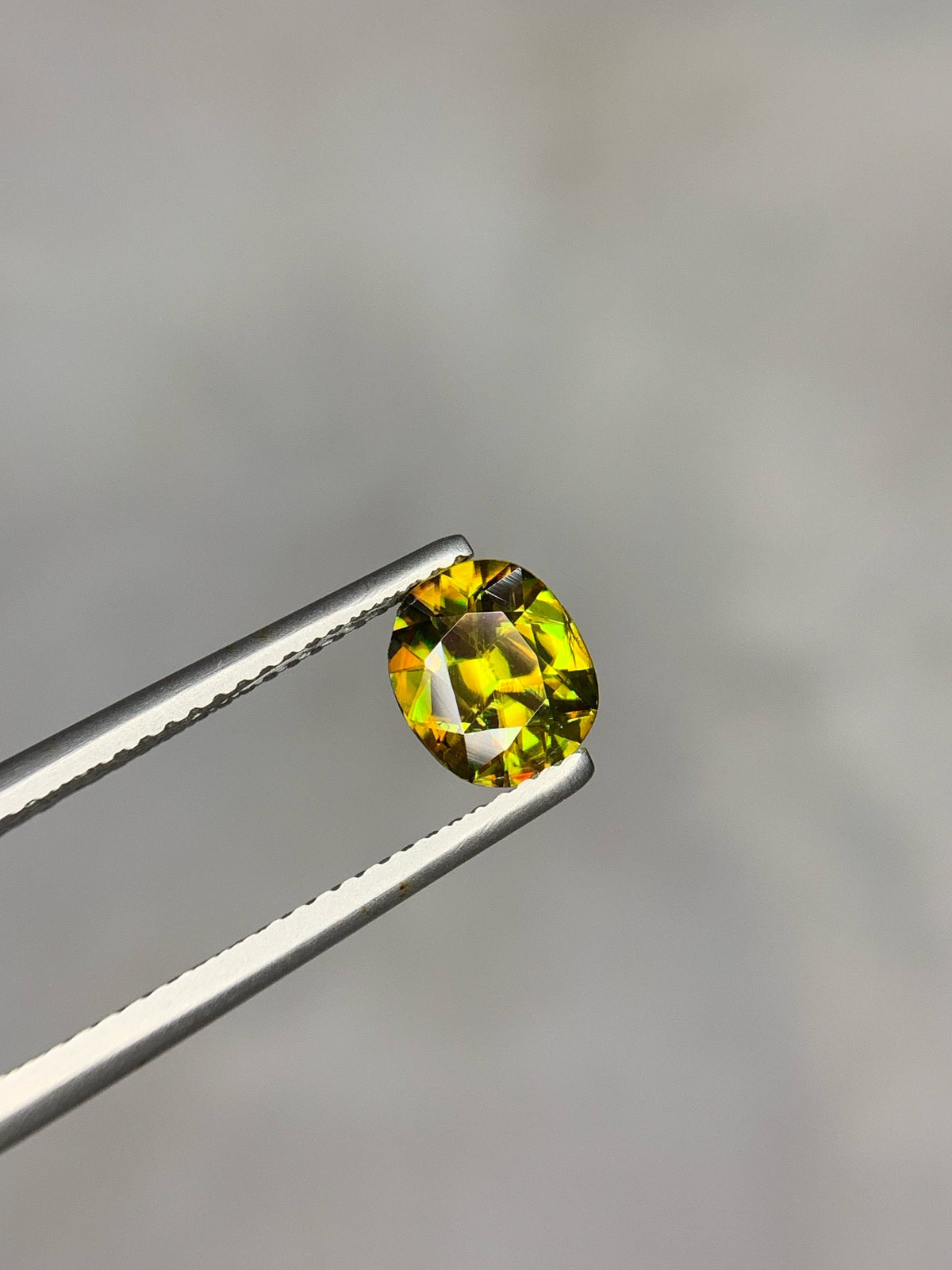 1.50 CT Natural Sphene Gemstone: Oval Cut, Himalayan Origin