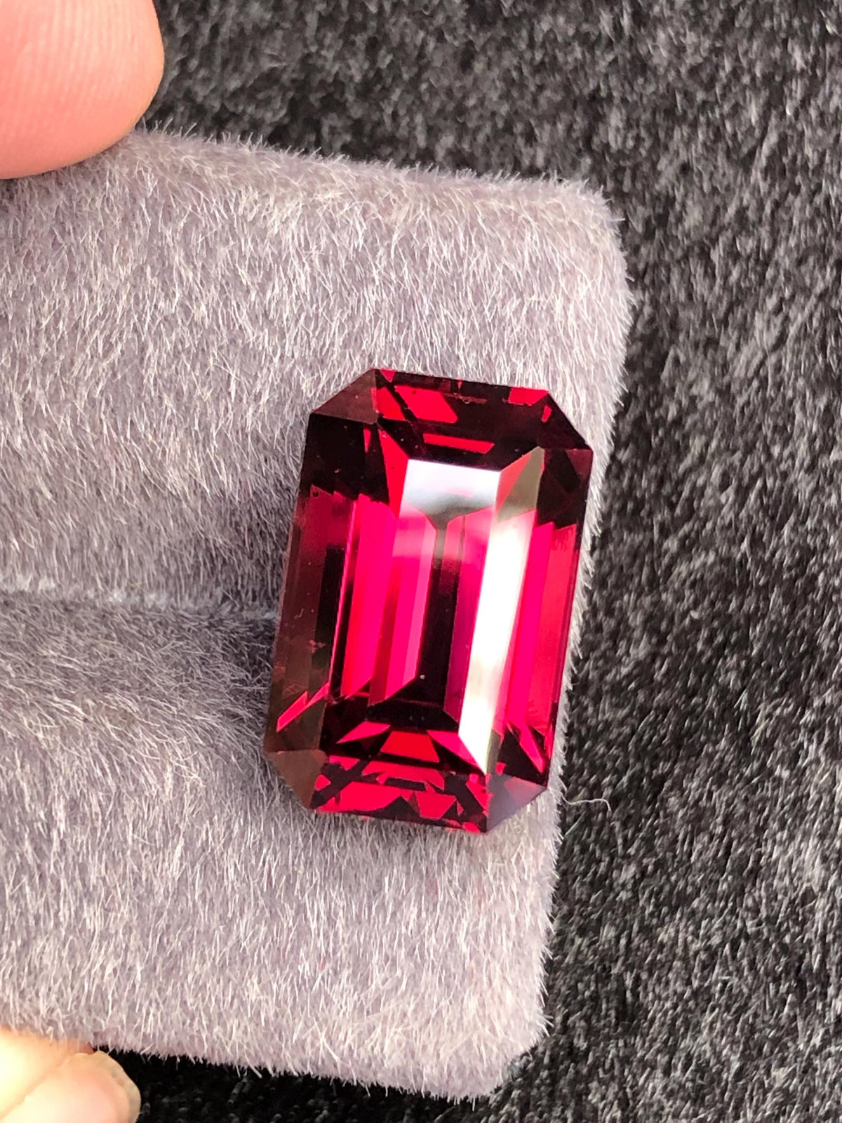 Red Rhodolite Garnet Emerald Cut 10.23 ct from Tanga Mine Tanzania