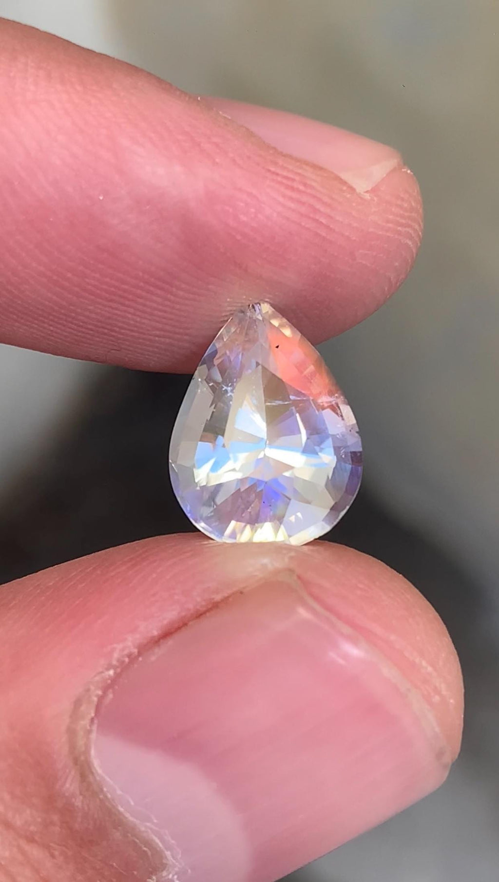 Rainbow Moonstone Gemstone: Pear Shape, VVS Clarity, Madagascar Origin