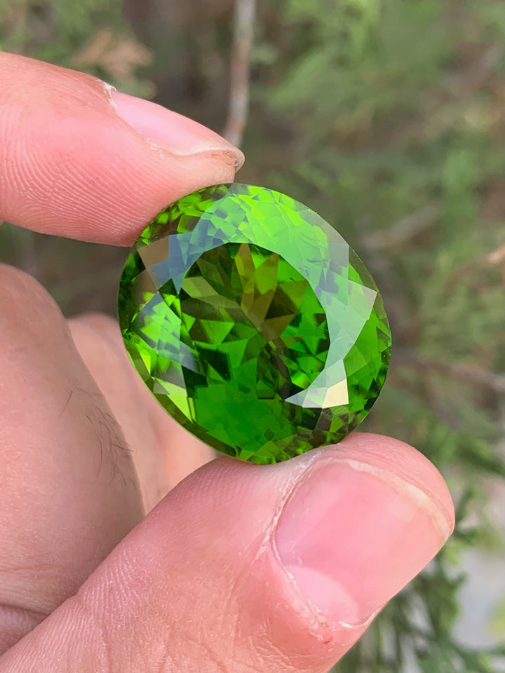 Lime Green Peridot Gemstone: 52.70 Carat Oval August Birthstone