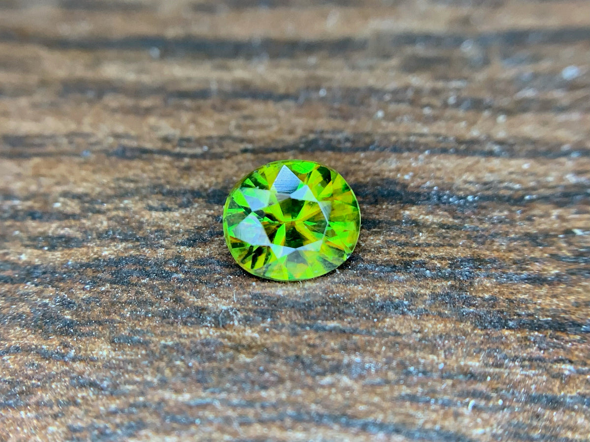 Natural Fire Sphene Gemstone: Round Cut, 0.95 ct, Himalayan Origin