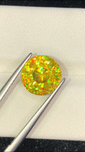 Trichroic Sphene Gemstone: 5.65 CT Round Faceted Titanite
