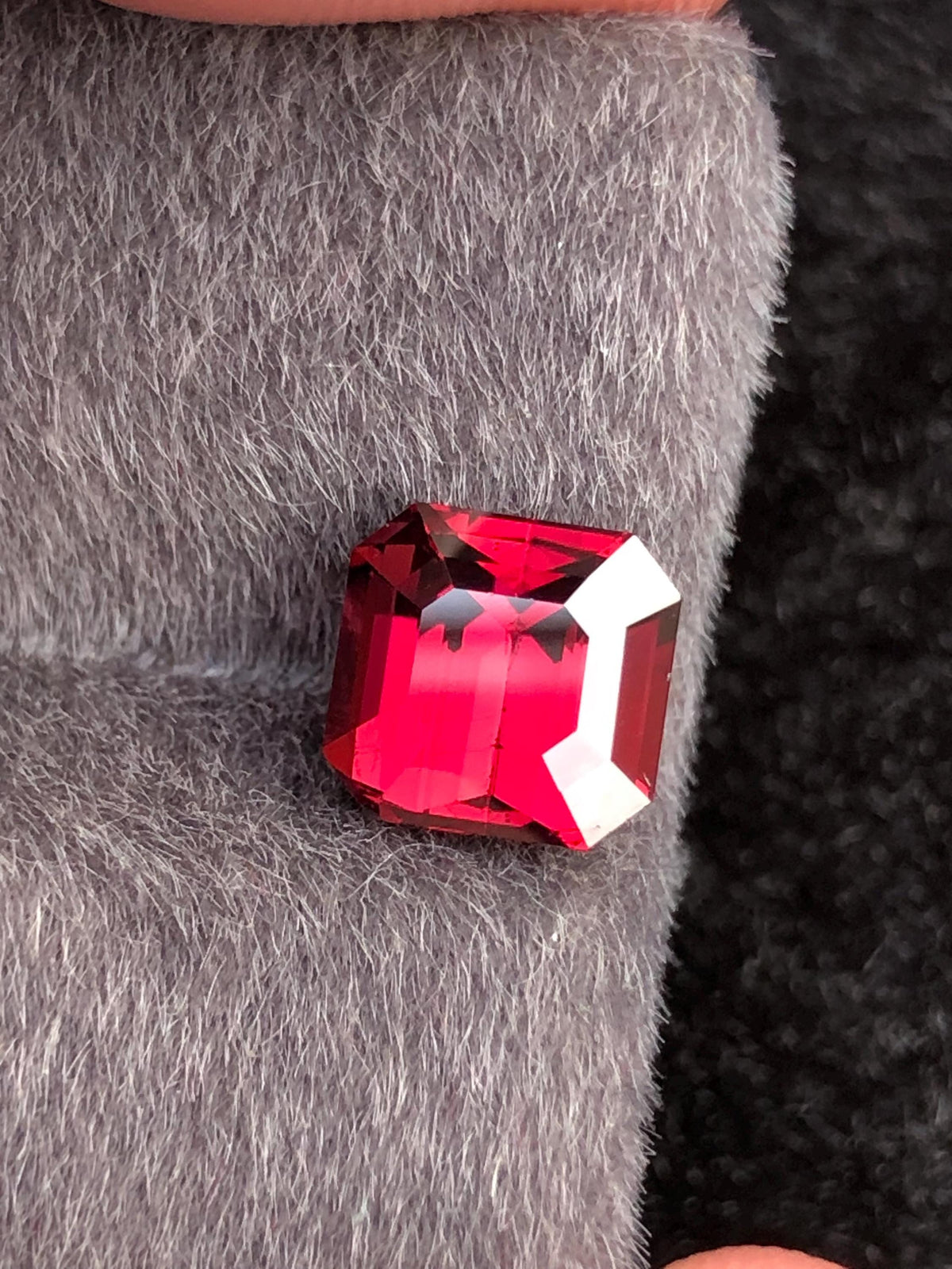 Red Rhodolite Garnet Emerald Cut 3.01 ct from Tanga Mine Tanzania