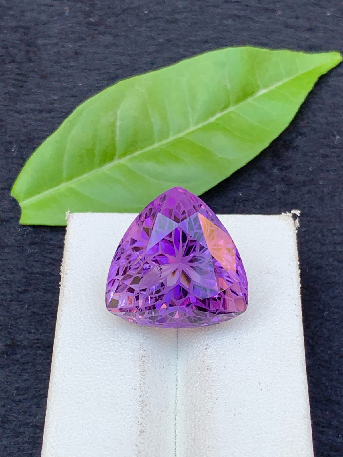 Triangular Amethyst Gemstone: 24.5 Carat Faceted Stone From Brazil