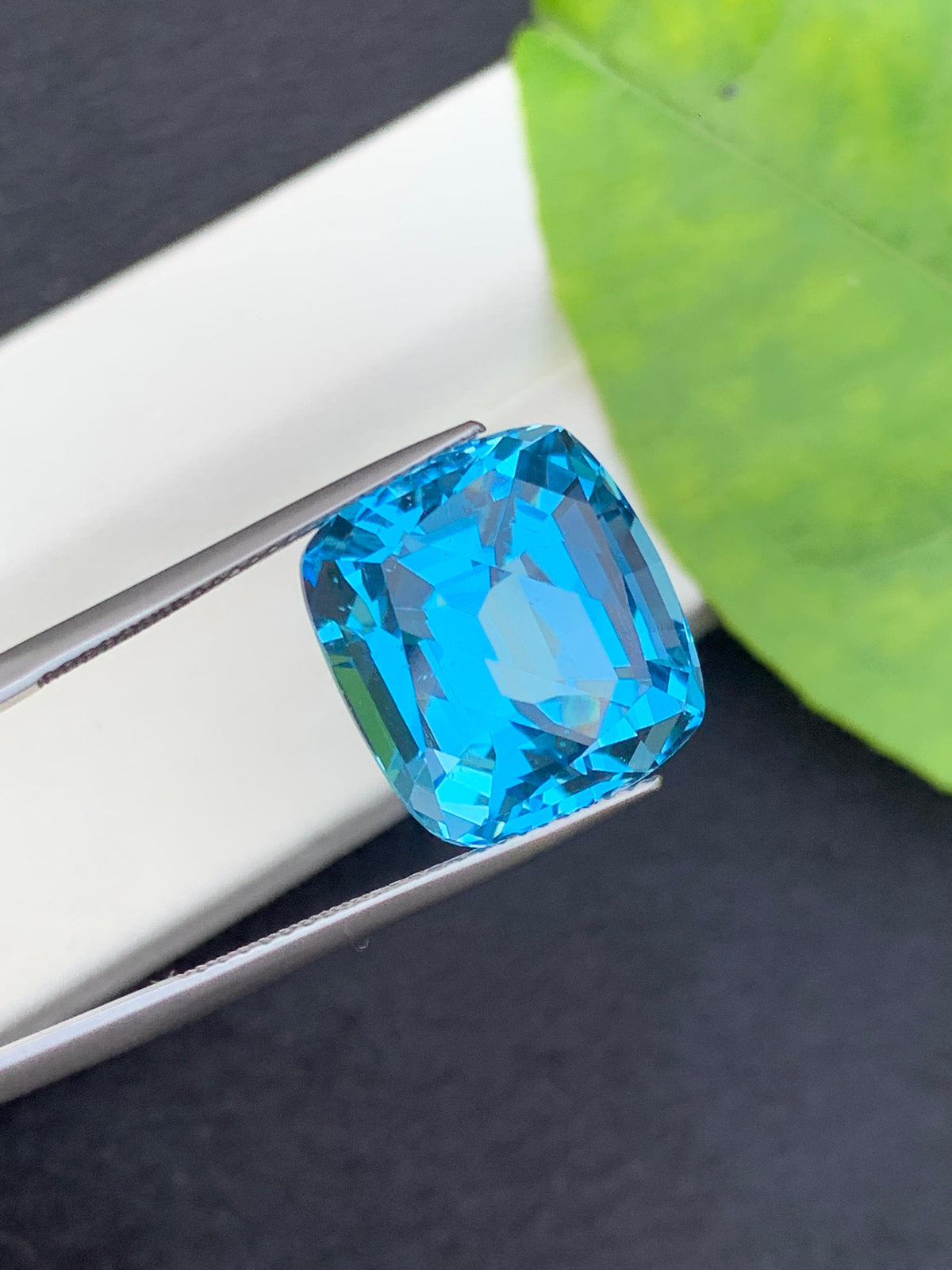 21.5 CT Swiss Blue Topaz Gemstone: Step Cushion Cut, Loupe Clean