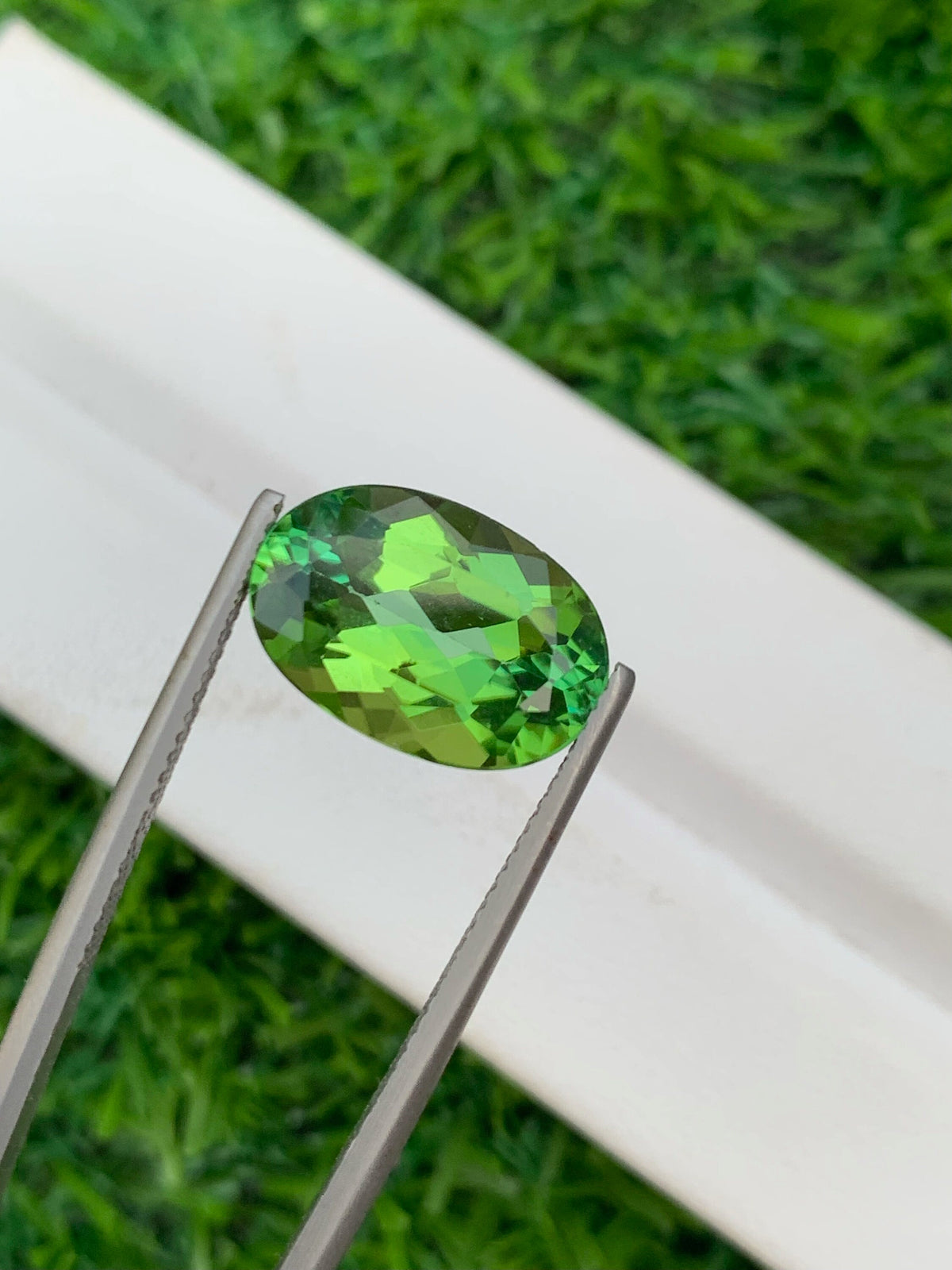 Vibrant Green Tourmaline Gemstone: Oval Cut, 6.60 CT, VVS Clarity