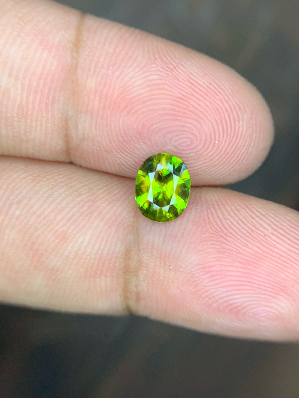 AAA Green Sphene Gemstone: Oval Cut, 0.95 CT, Himalayan Origin