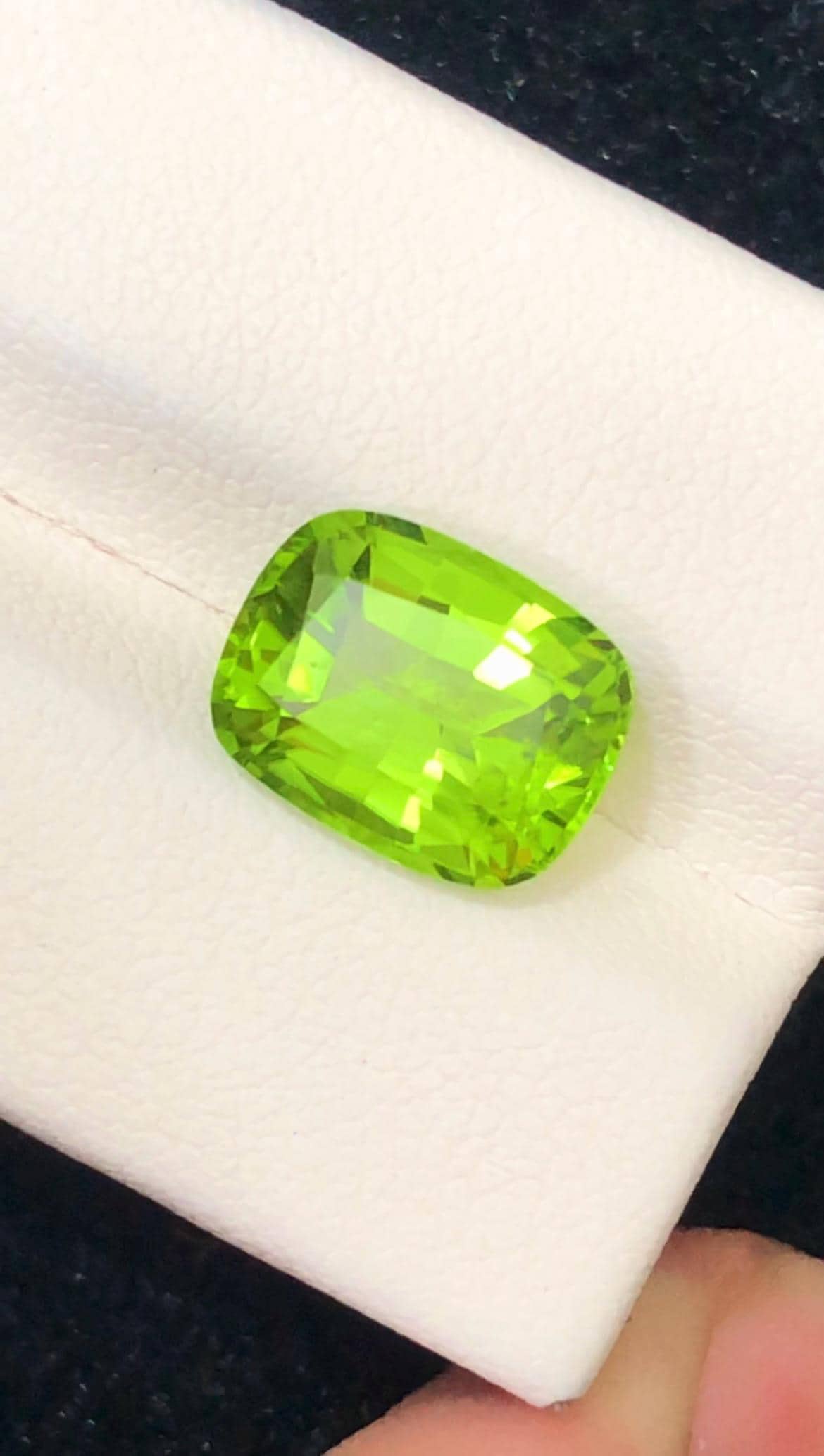 Green Peridot Cushion Cut in 5.15ct from Pakistan