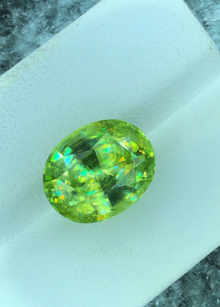 Apple Green Sphene Gemstone: Oval Cut, 8.85 CT, Himalayan Origin