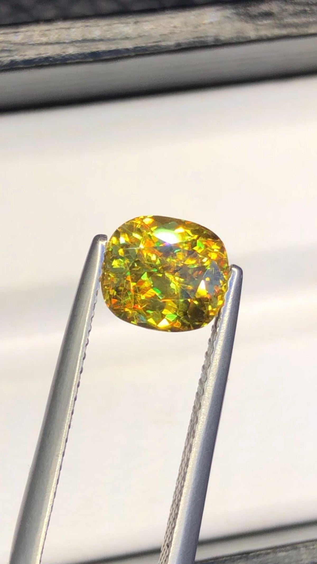 2.05 CT Cushion Cut Sphene Gemstone: Yellow-Red Trichroism