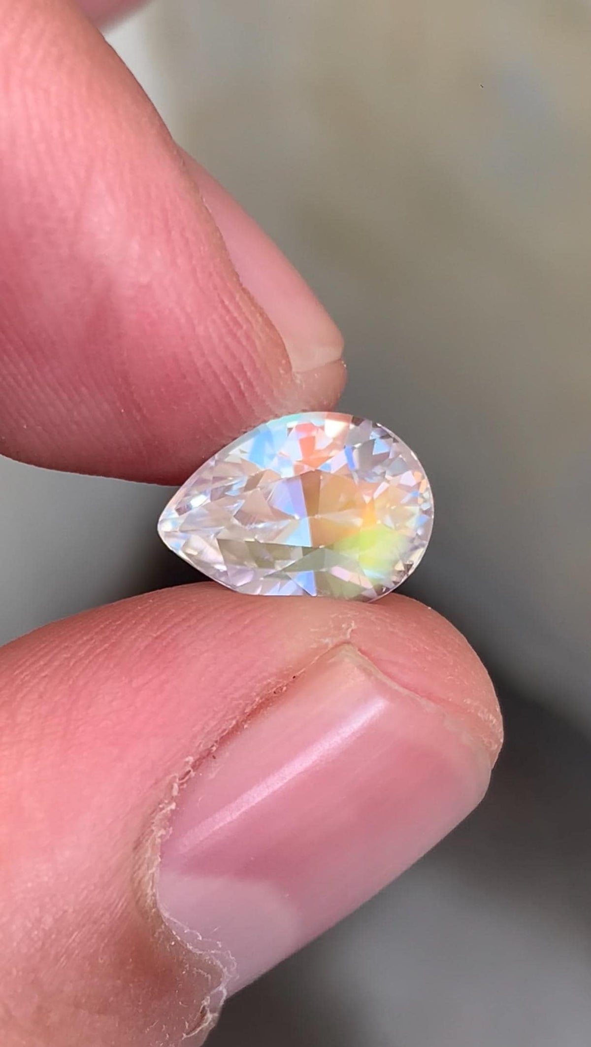 Rainbow Moonstone Gemstone: Pear Shape, VVS Clarity, Madagascar Origin