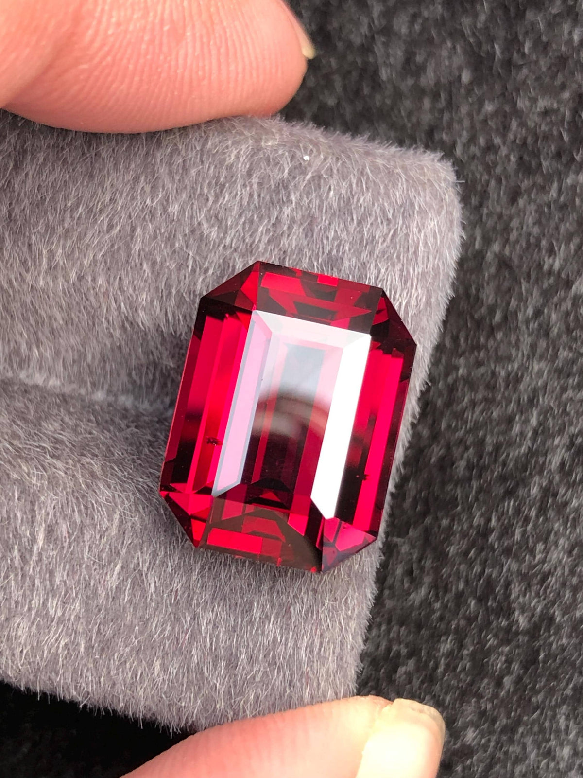 Red Rhodolite Garnet Emerald Cut 13.02 ct from Tanga Mine Tanzania