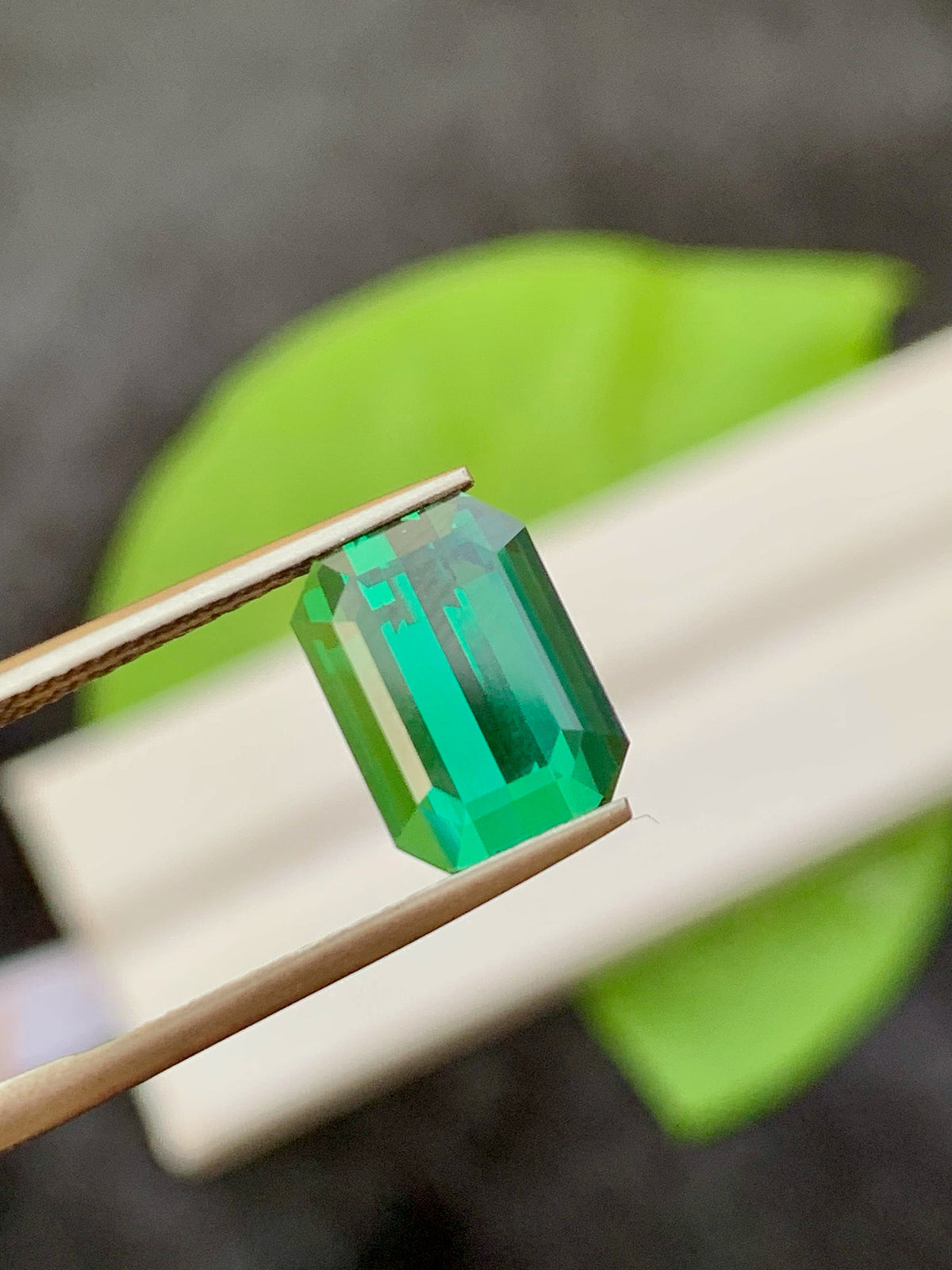 3.95 CT Forest Green Tourmaline Gemstone: Emerald Cut, Afghanistan Origin